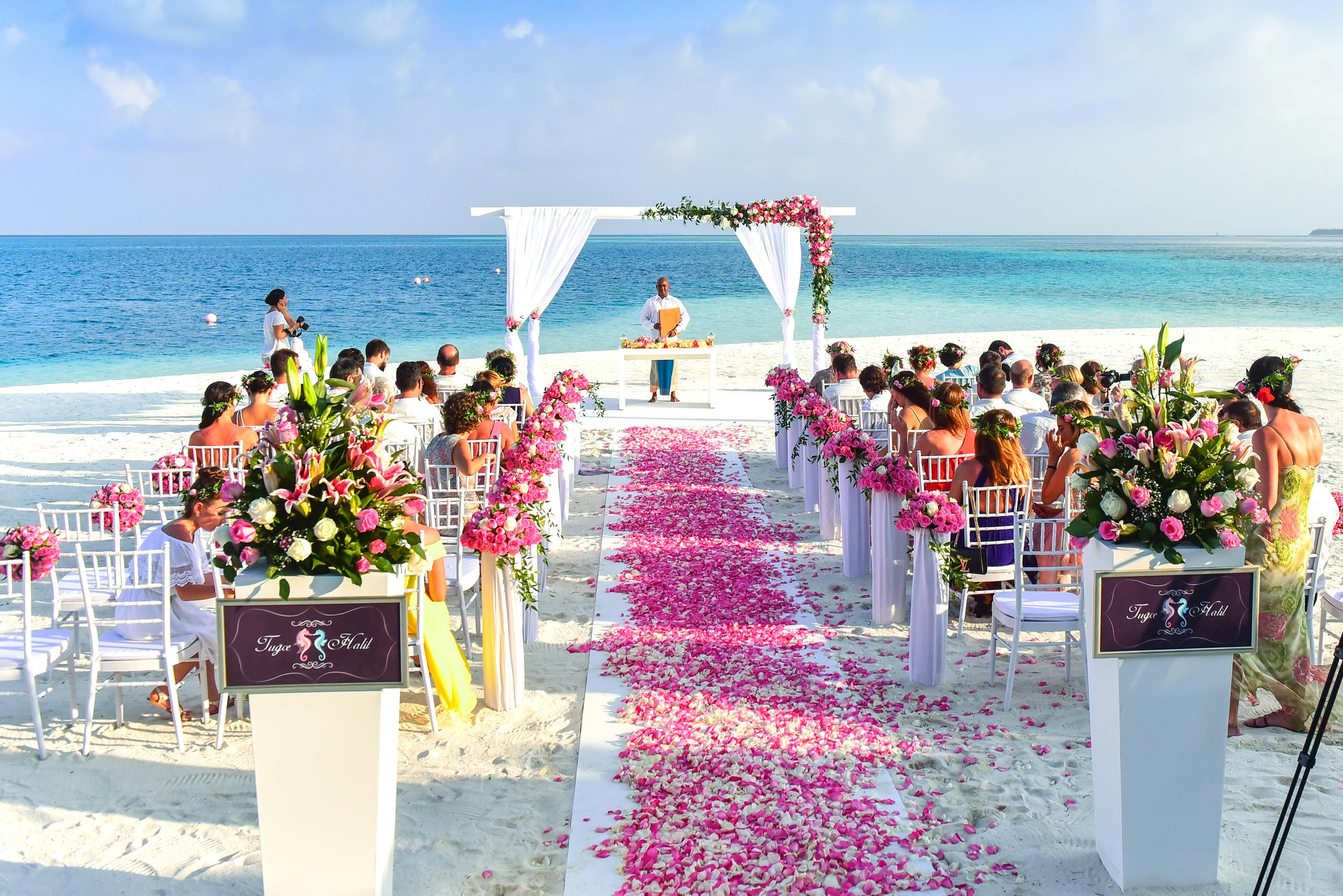 Flower filled wedding on beach 